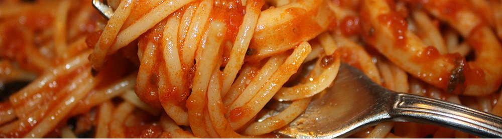 Spaghetti con sugo rosso e piccante di calamari.